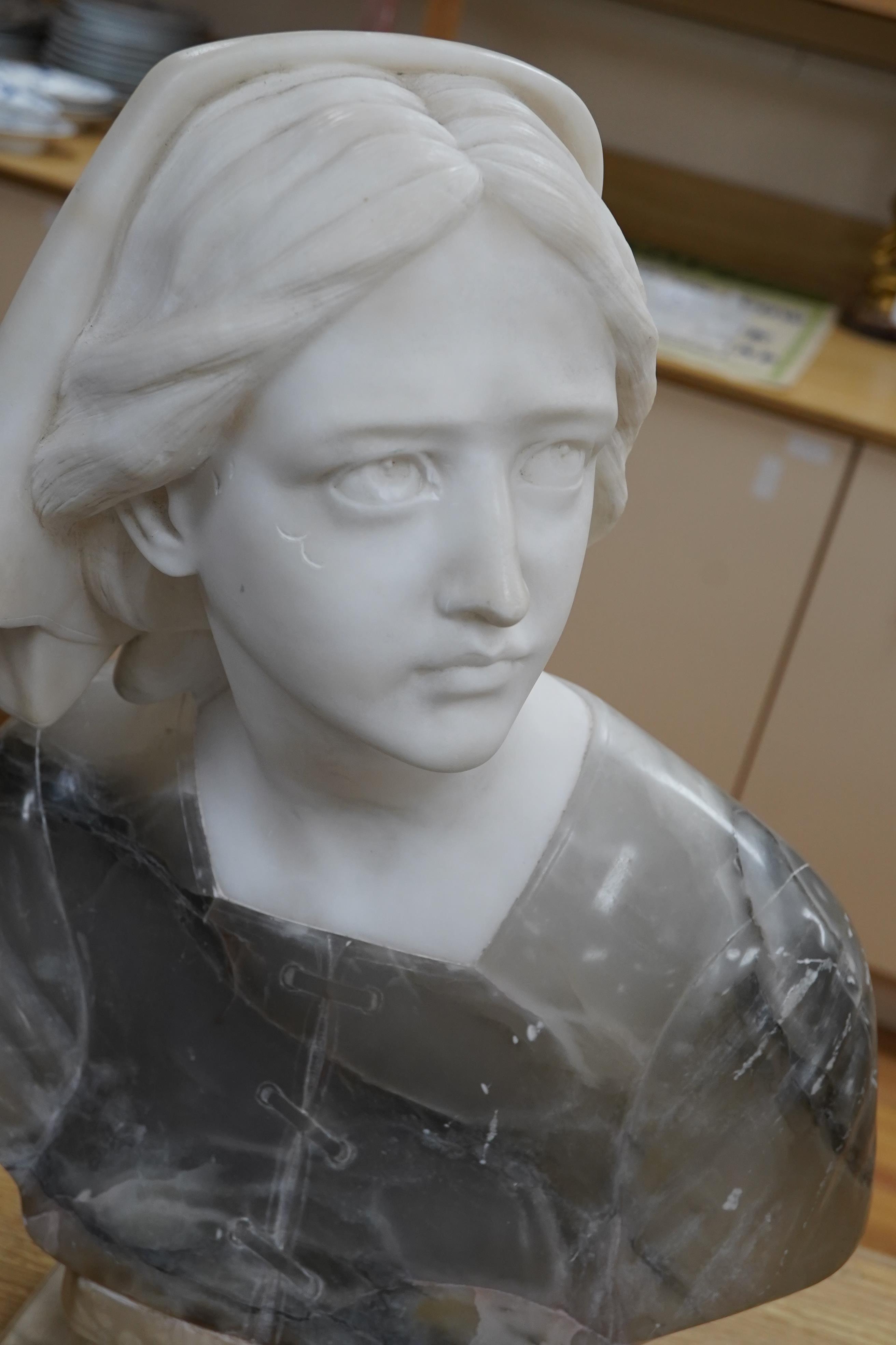 A French variegated alabaster bust of a young woman, 47cm high. Condition - scratch to top side of left cheek